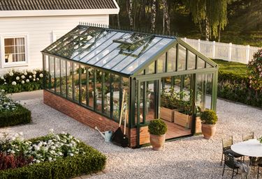 Eksempelbilde: Green Room Season Elegant, 19,9 m², plassert i en kjøkkenhage.